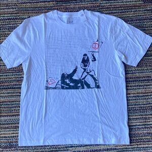 GAP Banksy Peace vs Love tee